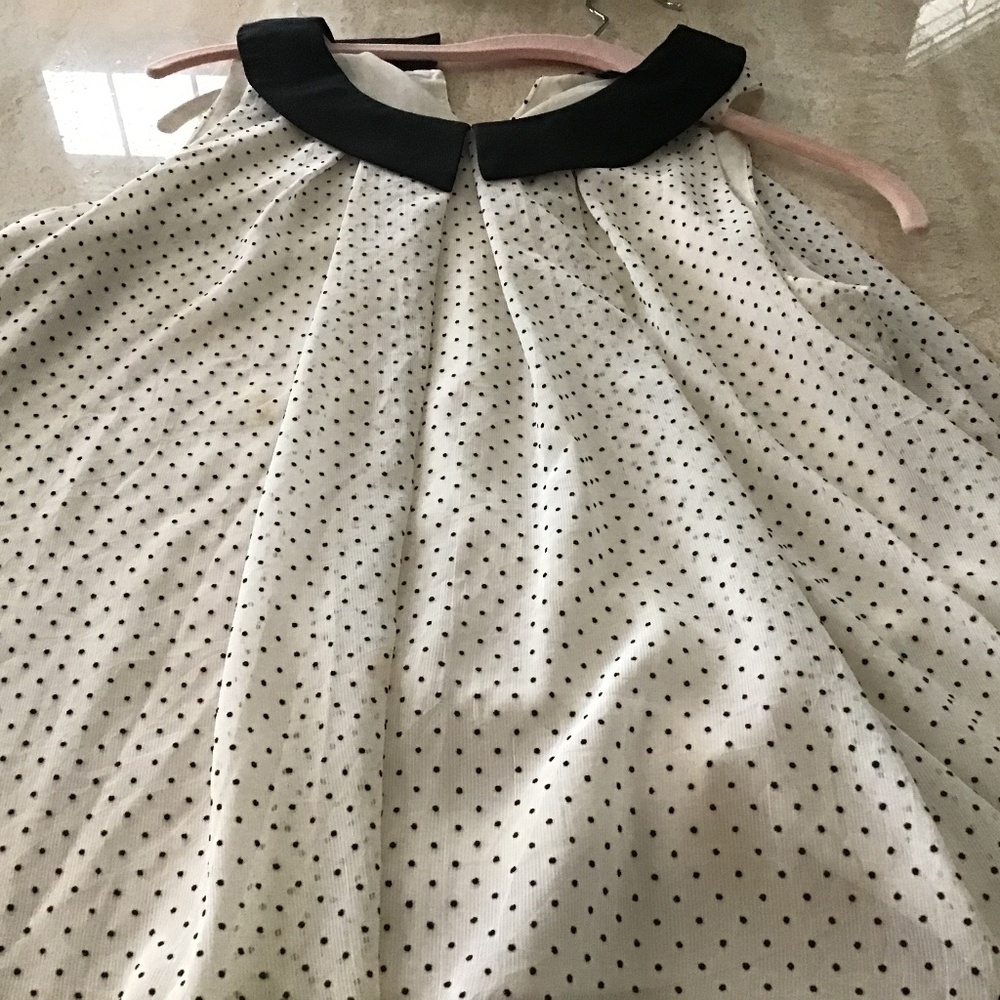 Beige and black Swiss dot sleeveless top